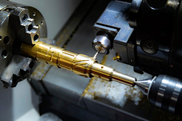 metal brass workpiece set on spindle chuck