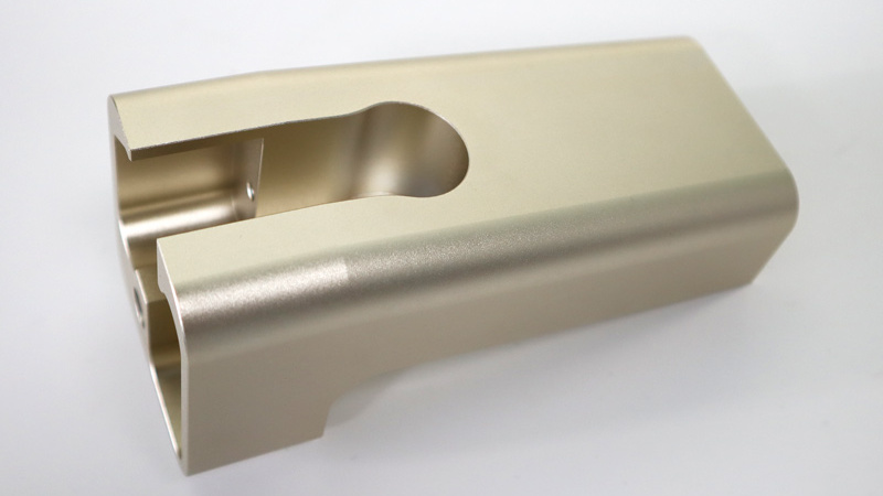 beadblst and gold anodized aluminum custom part