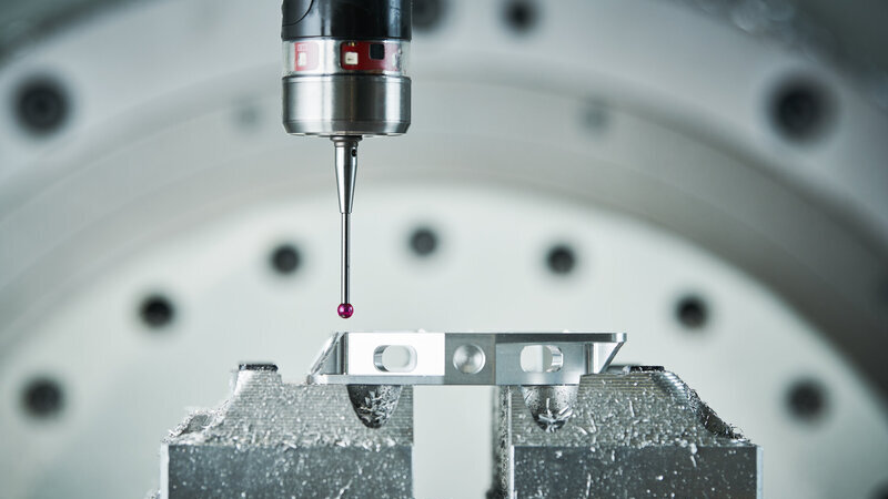 quality control on milling cnc machine. precision probe sensor at industrial metalworking